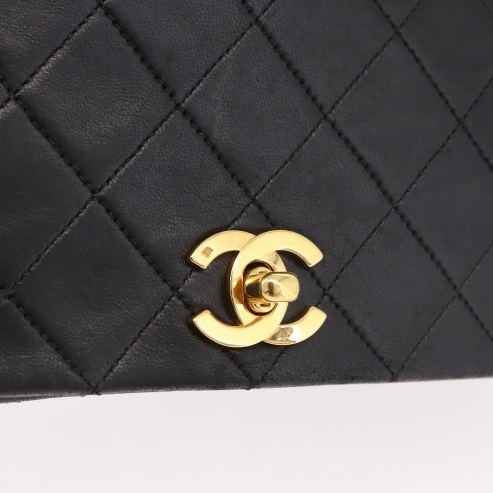 CHANEL Black Quilted Leather Shoulder Bag with Gold Hardware